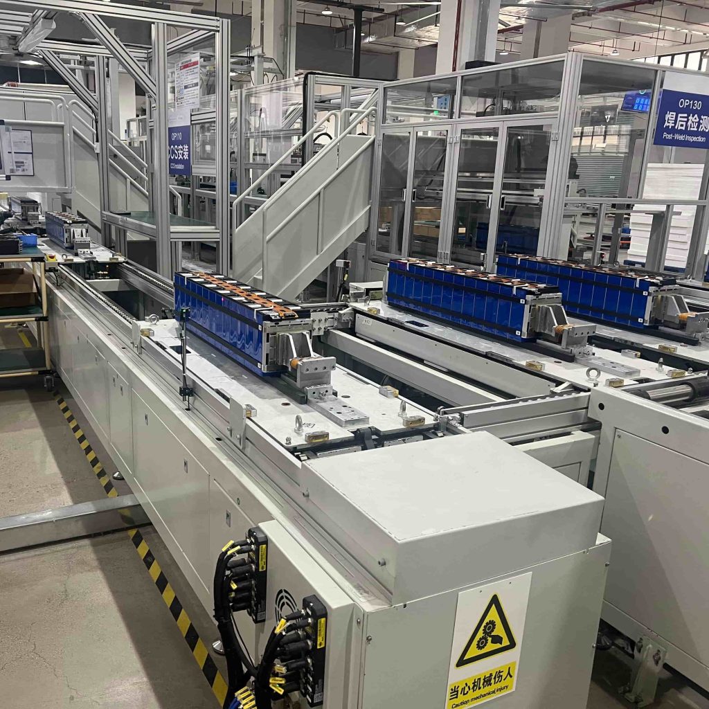 Automated post-weld inspection line for MegSolid hybrid solid-state battery modules at the manufacturing plant.